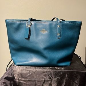 Dark teal coach purse